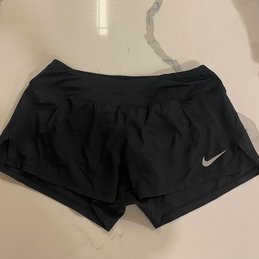 Nike black running shorts w functional draw string Size M. In like new condition